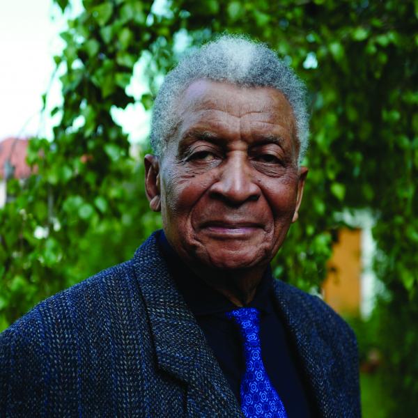 Portrait of man standing outside. 