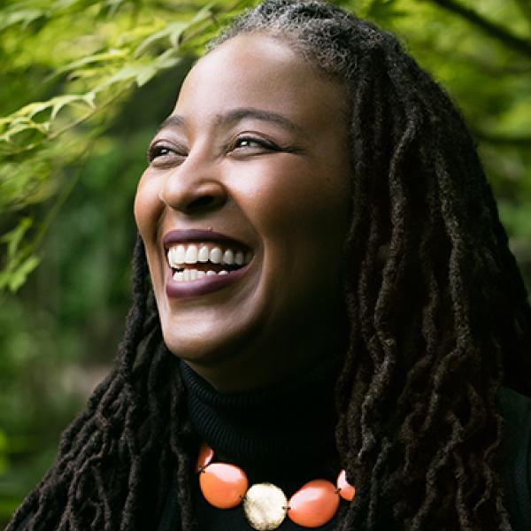Headshot of a woman smiling.