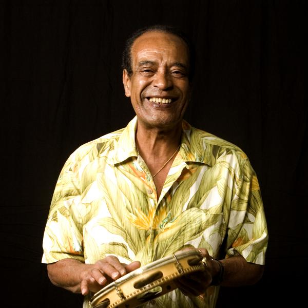Man playing a percussion instrument.