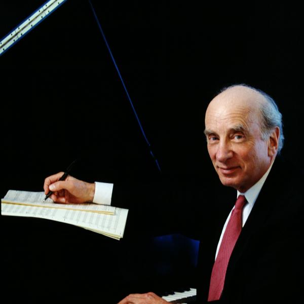 Man sitting at a piano.