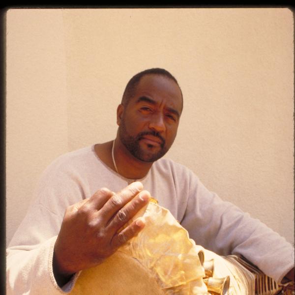 Man holding drum.