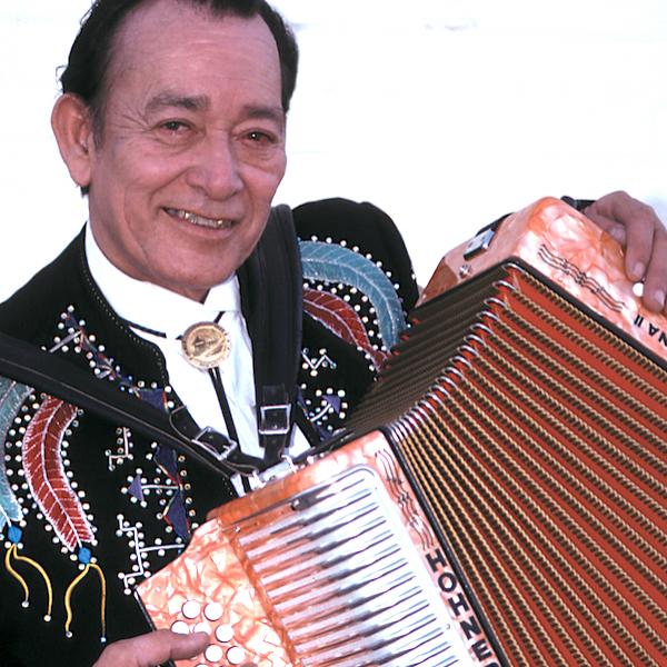 A man playing the accordion.