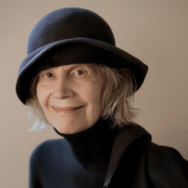 portrait of woman wearing a hat. 