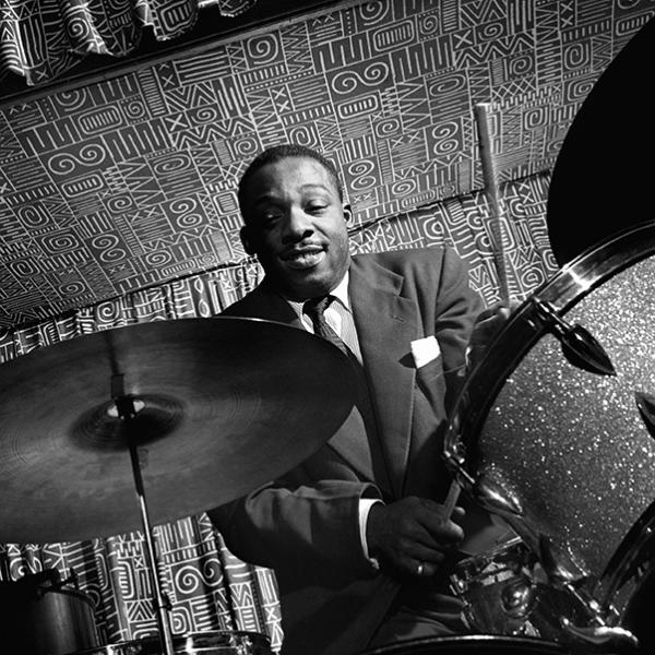 Man playing drums. 