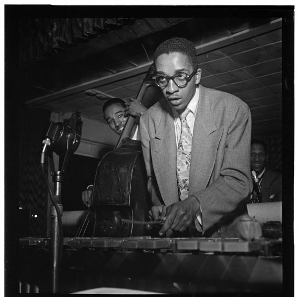 Man playing the vibes on stage. 