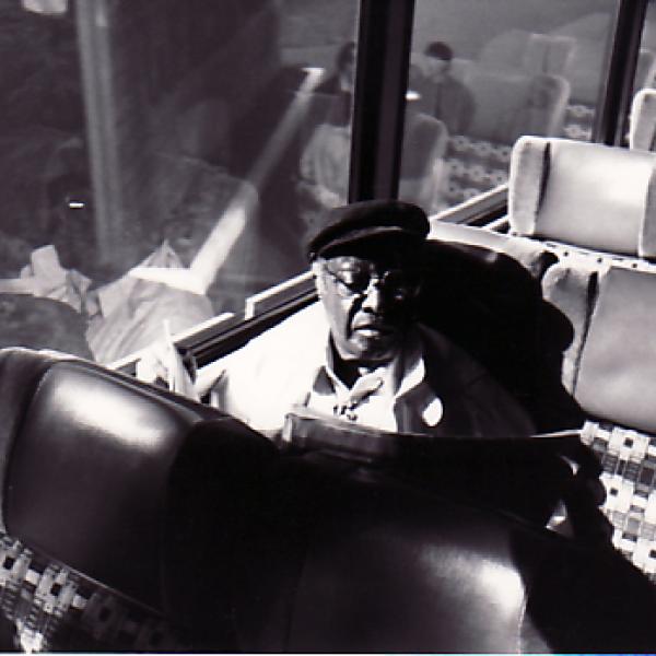Man sitting on bus. 