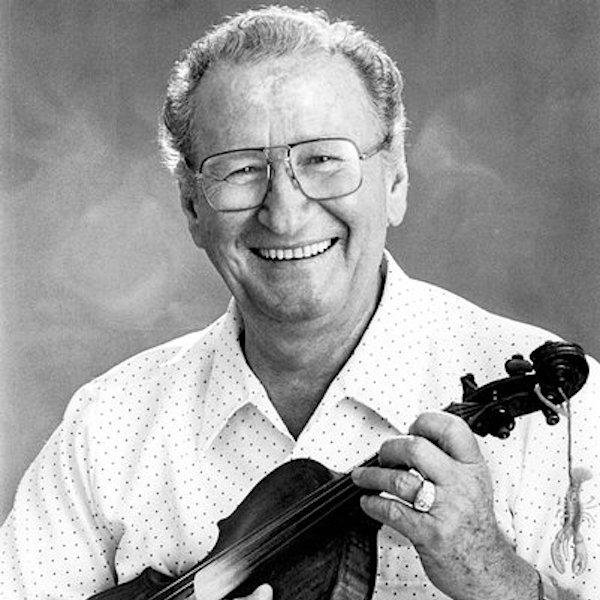 Man holding a fiddle.