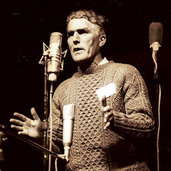 A man speaking into a microphone.