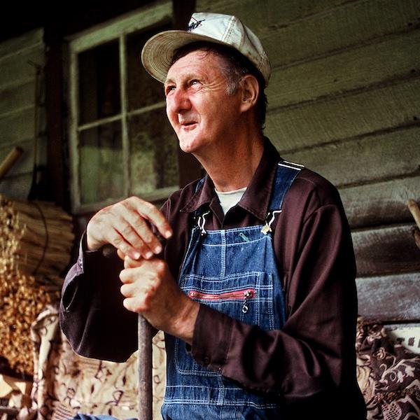 A man sitting on a porch.