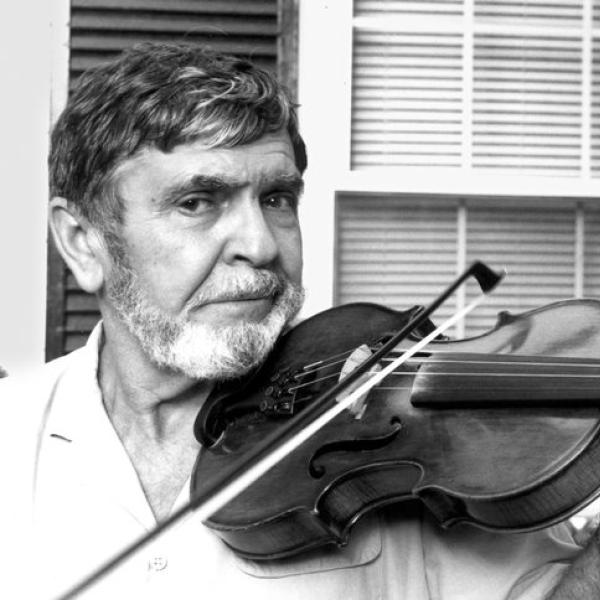 Man playing a fiddle.