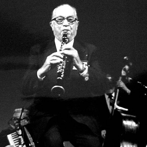A man playing a clarinet.