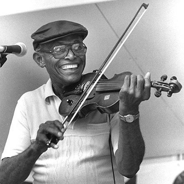 Man playing a fiddle.