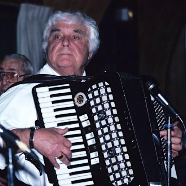 Man playing an accordion.