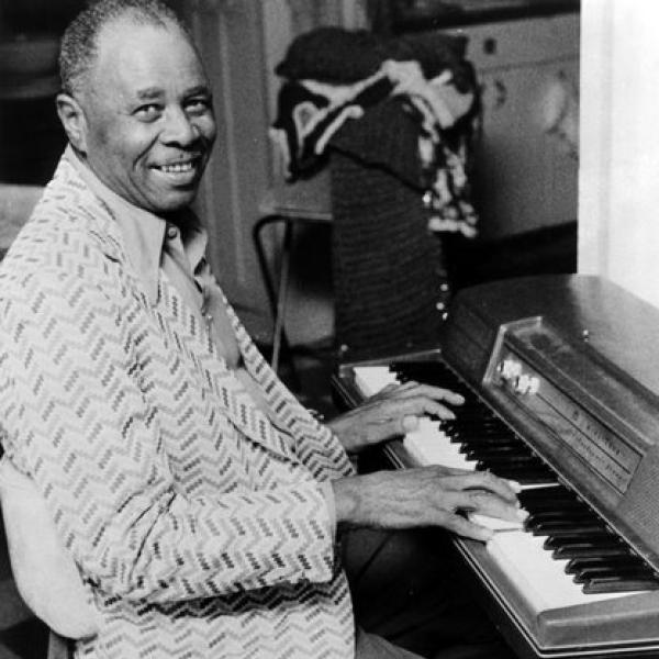 A man playing a piano.
