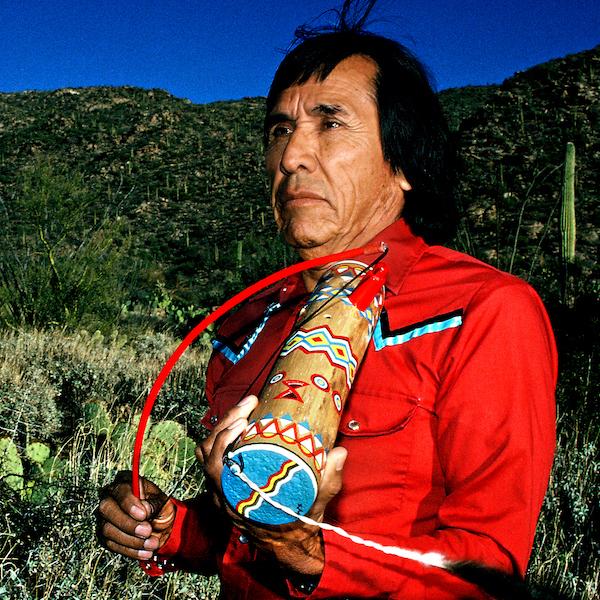 Man holding an instrument.