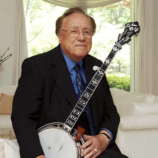 A man holding a banjo.