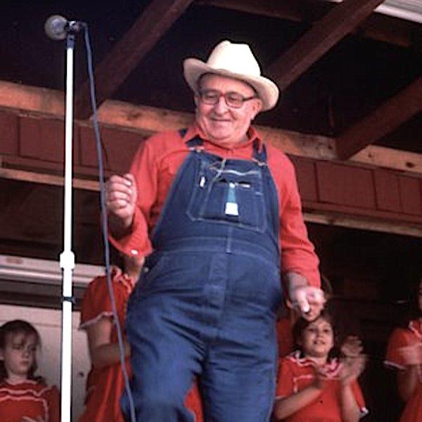 A man doncing on a stage.