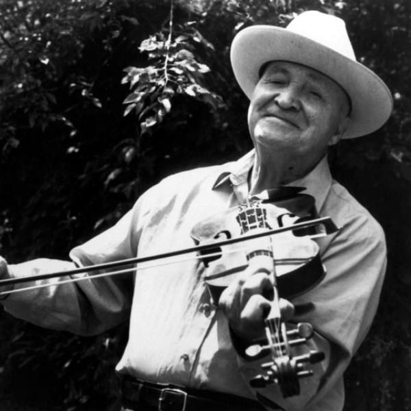 Man playing a fiddle.