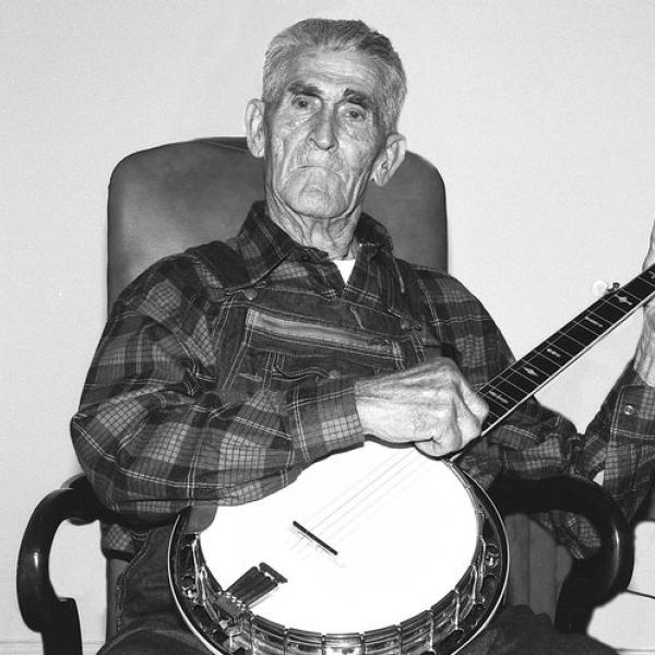 A man holding a banjo.