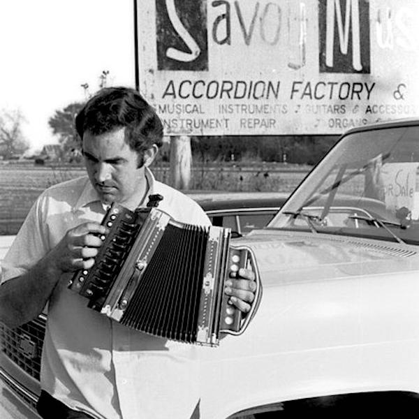 A man playing the accordion.