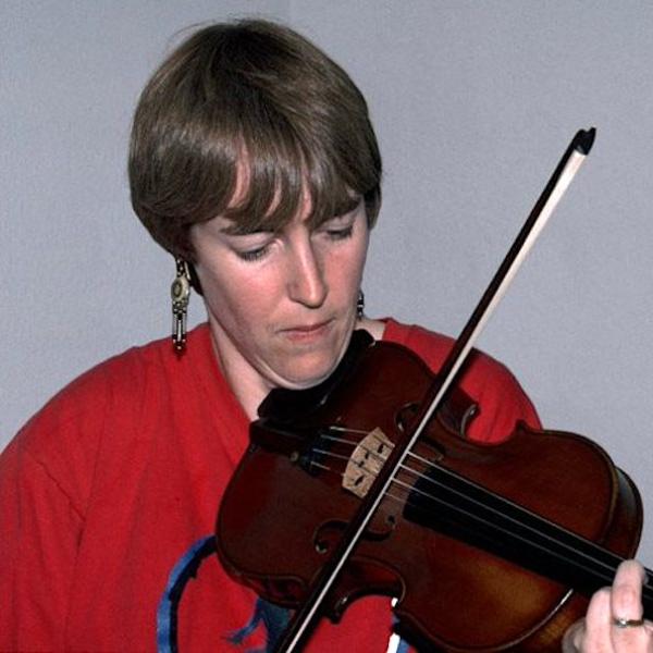 A woman playing a violin.