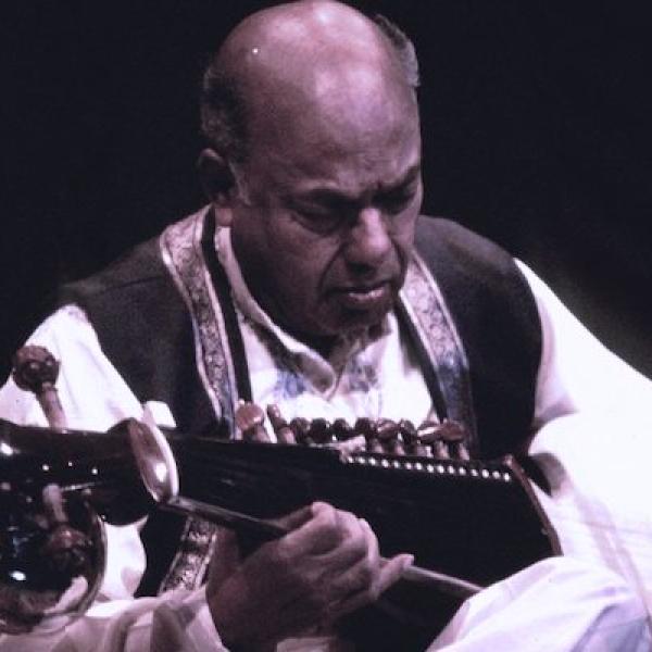 A man playing an instrument.