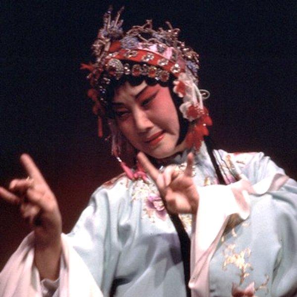 A woman string a dance pose.