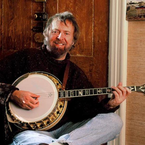 A man playing a banjo.