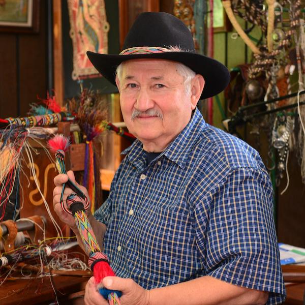 A man holding a flute.