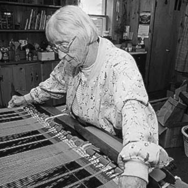 A woman with loom.