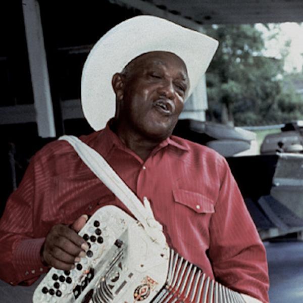 A man playing an accordion.