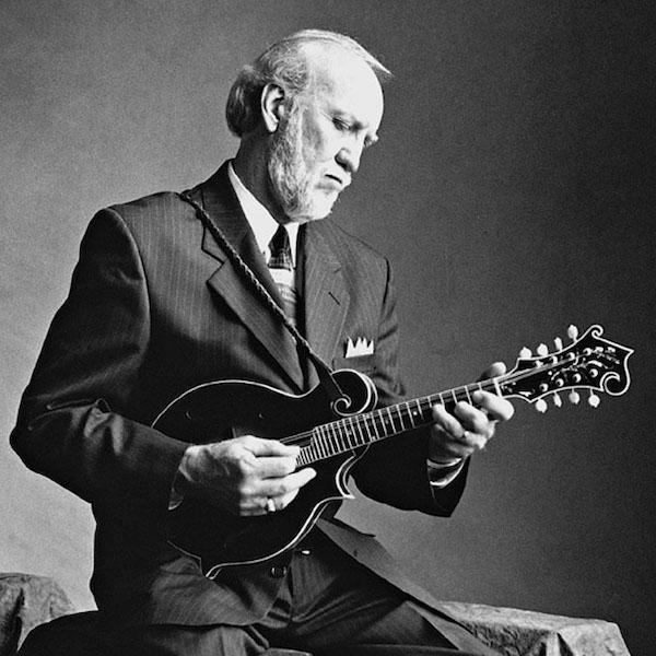 A man playing a mandolin.