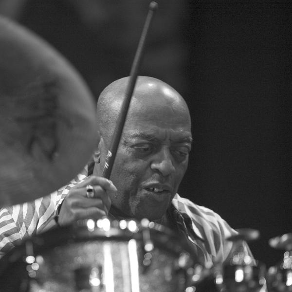 Man playing drums. 