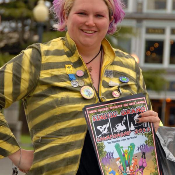 Woman holding a publication.