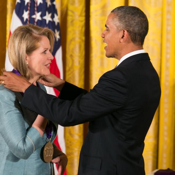 Fleming receiving her medal form President Obama.