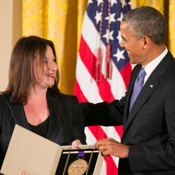 Jenny Bilfield, president and CEO of Washington Performing Arts Society, accepts the 2012 National Medal of Arts on behalf of the Washington Performing Arts Society from President Barack Obama