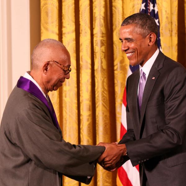 Ping Chong receives his medal from President Obama