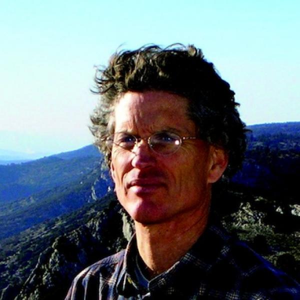 Man in mountainside. 