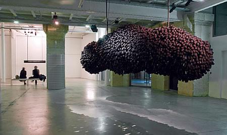 Thousands of microphones in the shape of a cloud hanging from the ceiling.