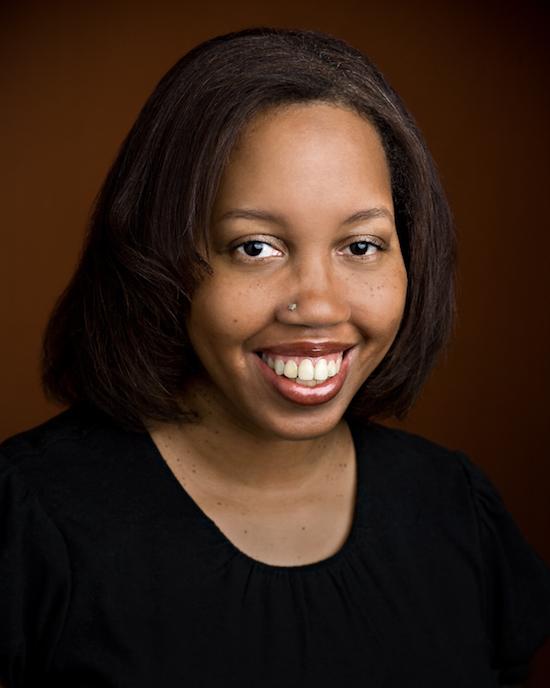 a medium-complexion African-American woman with a nose stud