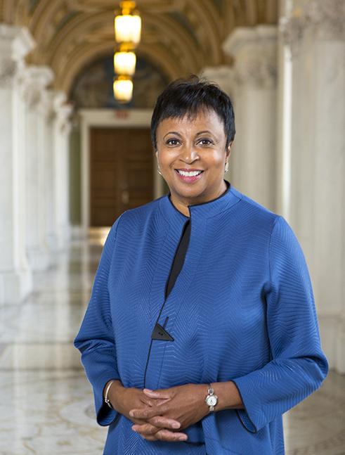 Portrait of Carla Hayden in a hall in the Library of Congress.