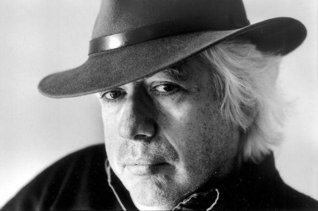 Leon Wieseltier Headshot Black and white photo of a man in a hat