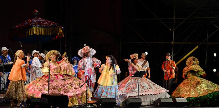 Bands playing maracatu music on stage at Lincoln Center. 