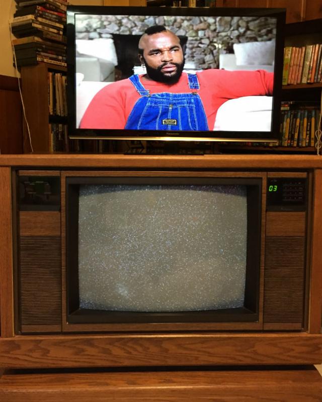 Mr. T on a flat-screen television Flat-screen television resting on CRT television
