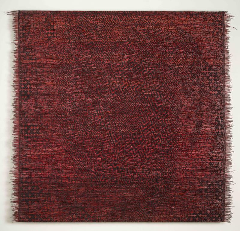 Photo of a red patchwork.