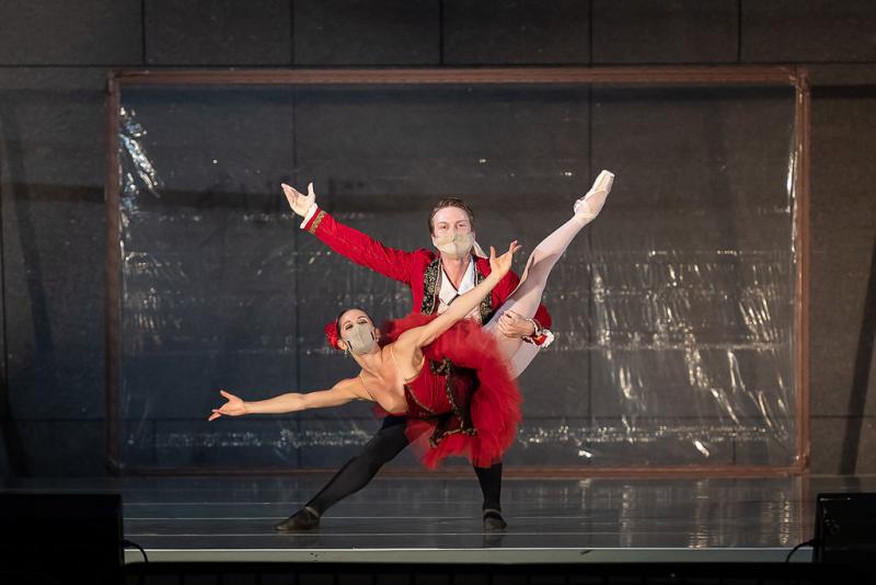 Don Quixote pas de deux Cincinnati Ballet Two dancers in red costumes and masks