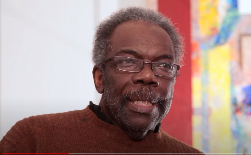 Black man with glasses. 