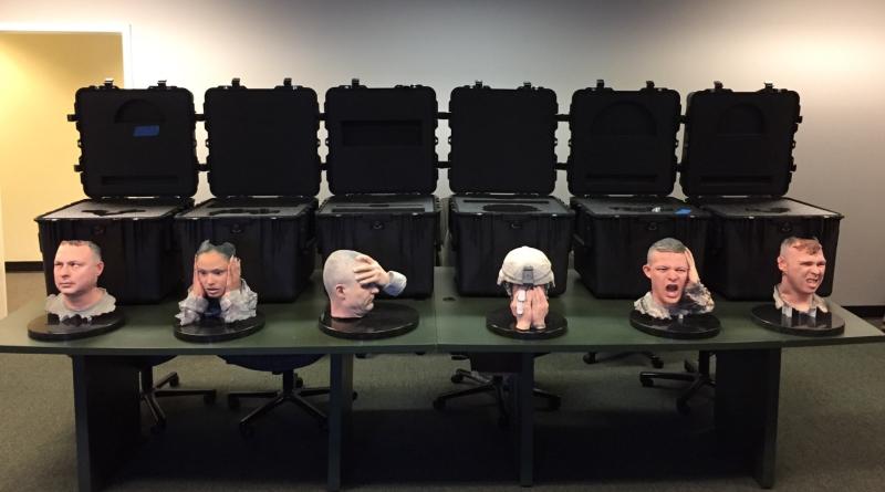 sculpted busts of various service members