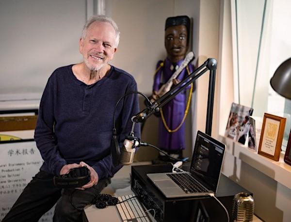 A man in an audio studio.