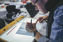 An architect draws